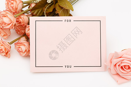 粉色购物花与信封背景