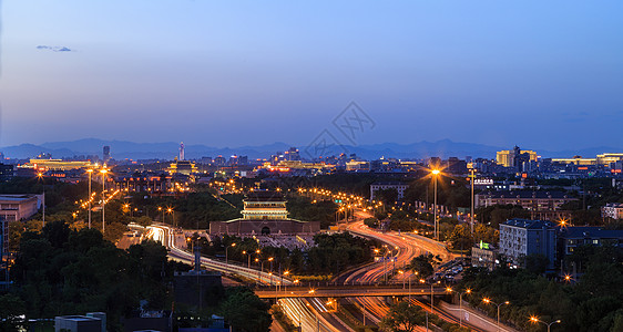 俯视城市夜景灯光辉映永定门背景