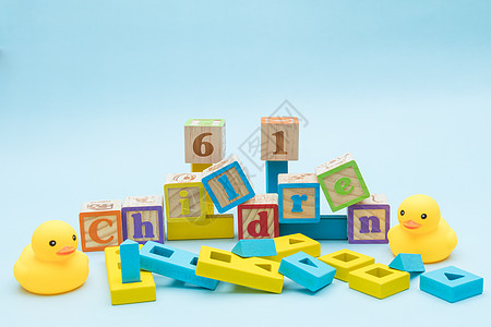 积木玩具优惠劵小黄鸭积木海报素材背景