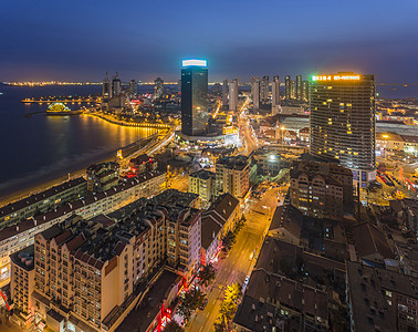 海上度假酒店沿海城市夜景背景