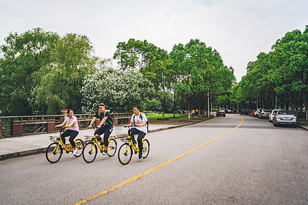 骑车自行车校园背景图片