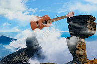 横跨在山上的吉他图片