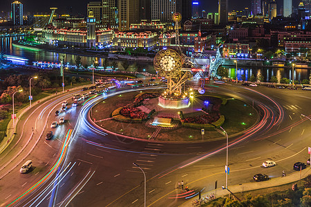 夜晚道路天津世纪钟背景