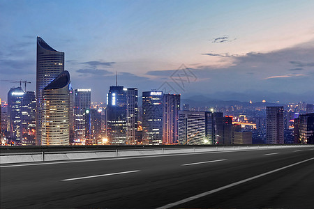 房产广告素材公路旁边的城市夜景设计图片