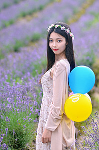 上海莫斯利安百草园拿气球的美女背景图片