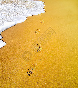 沙滩脚印背景图片