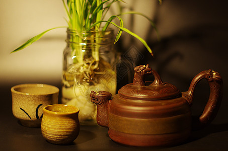 兰花和茶具背景图片