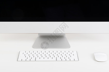 手机黑白摆放整齐简洁的苹果电脑一体机背景