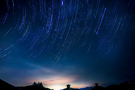 蓝色星光日月庙星空背景