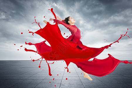 穿着红色油漆长裙跳舞的女性图片