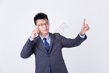 商务男人元素手指点击前方正在思考的商务男士背景