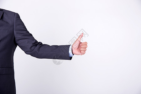 科技点赞商务男士竖起大拇指手部特写背景