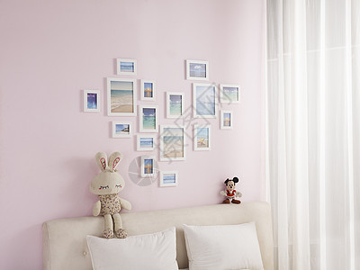 客厅背景墙粉红色家居相框组合背景