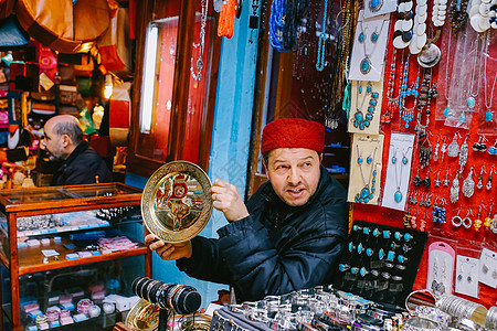 北非明珠突尼斯大巴扎麦地那里的商人背景图片