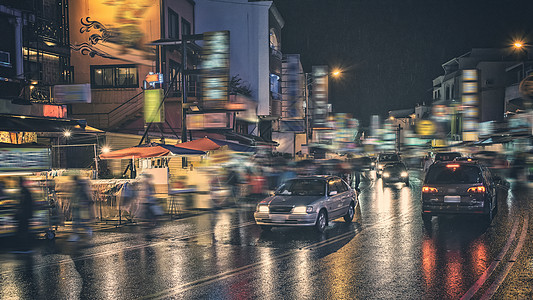 雨后的街道灯红酒绿下雨高清图片