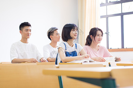 同学交流教室里认真做上课的同学背景