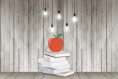 发光的书木板背景下的书设计图片