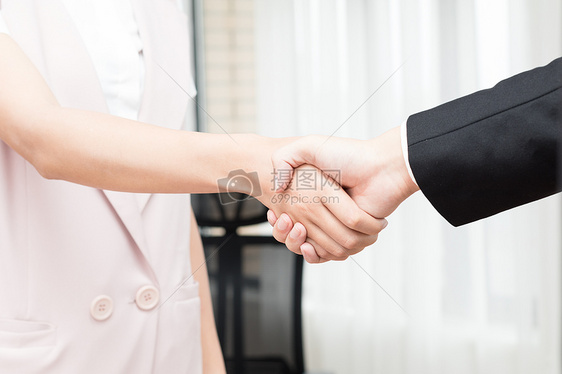 商务合作握手交易图片