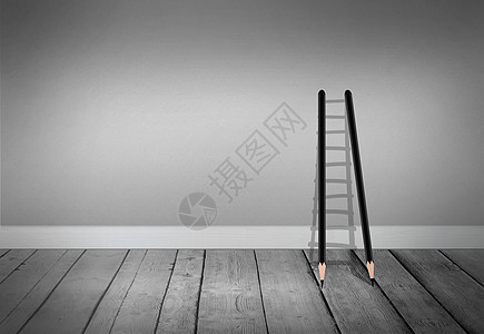 灰色空间的铅笔梯子背景图片