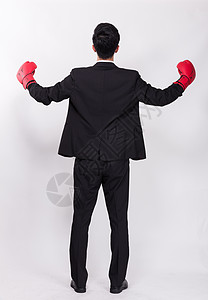 商务人士戴拳击手套高清图片
