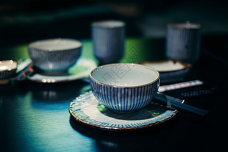 复古陶瓷咖啡壶日式料理碗筷背景