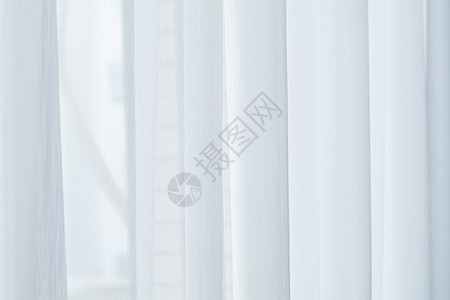 背景窗户自然下垂的白色窗帘背景