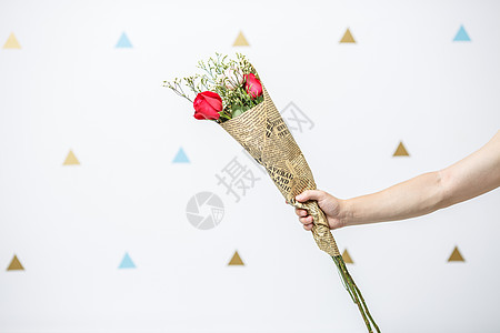 手拿一束鲜花手拿一束玫瑰花背景