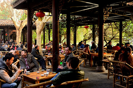 习俗成都人民公园内的传统茶馆背景