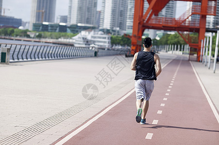 跑步男性男孩在户外跑步运动锻炼背景