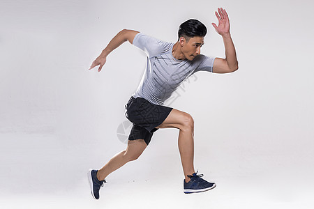 运动男士跑步动作高清图片