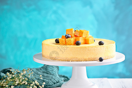 地中海芝士芒果蛋糕背景图片