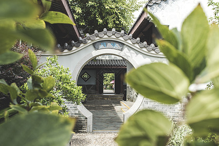 中国风过建筑庭院门拱背景高清图片