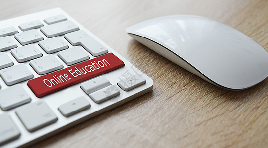 在线教育键盘上的红色按键图片