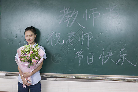 教师节女老师收到鲜花背景图片