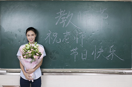 教师节女老师收到鲜花背景图片