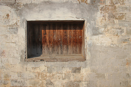 古窗斑驳的古墙构图背景
