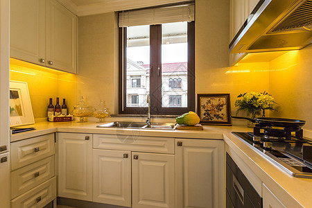橱柜灯简洁宽敞的厨房背景