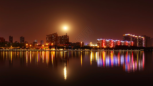 水面月亮汾河夜景背景