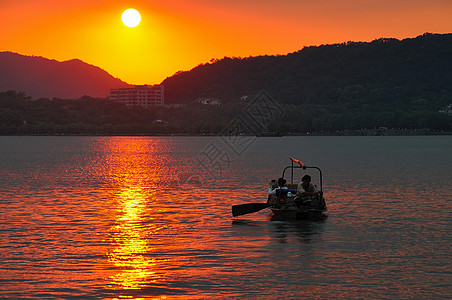 西湖背景西湖夕阳游船背景