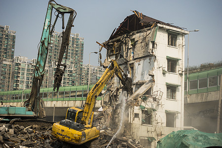工业城市城市发展时拆除房子背景