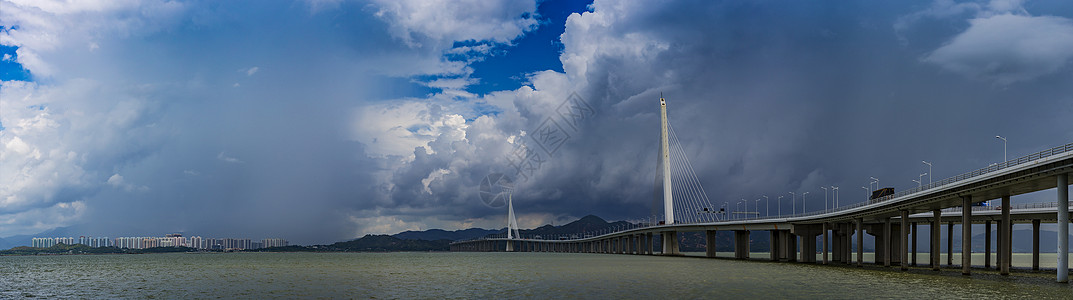 天后像深圳湾跨海大桥与香港新界天水围城市风光背景