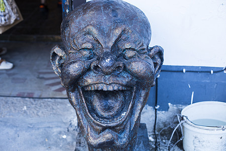 笑脸表情的雕塑背景图片