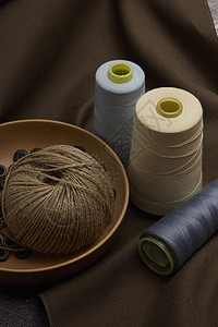 缝纫机线毛线织物布料静物背景