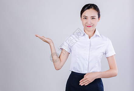商务女士欢迎动作图片素材