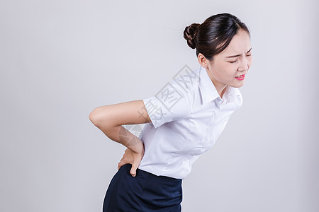 女性腰疼商务女士痛苦难受情绪表现背景