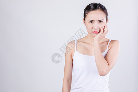 人像女居家女人表现牙疼情绪背景