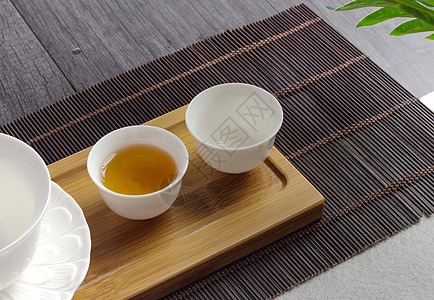 茶叶工艺素雅的白瓷杯背景