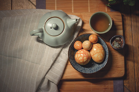 营养饮食茶叶蛋与茶壶背景