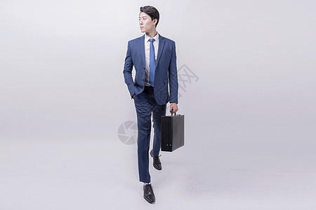 工作证公务商务人士拎包走路动作背景