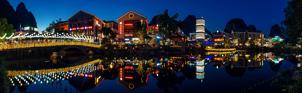 桥 手绘桂林阳朔西街步行街夜景背景